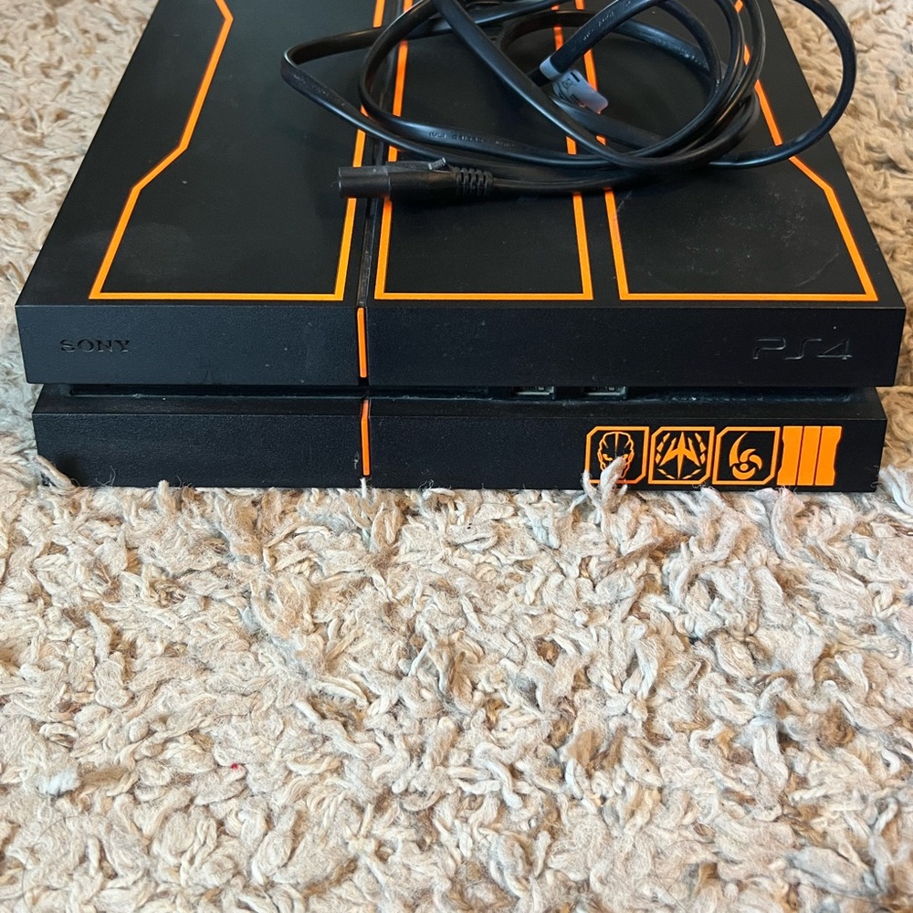 Sony PS4 Black and Orange Console
